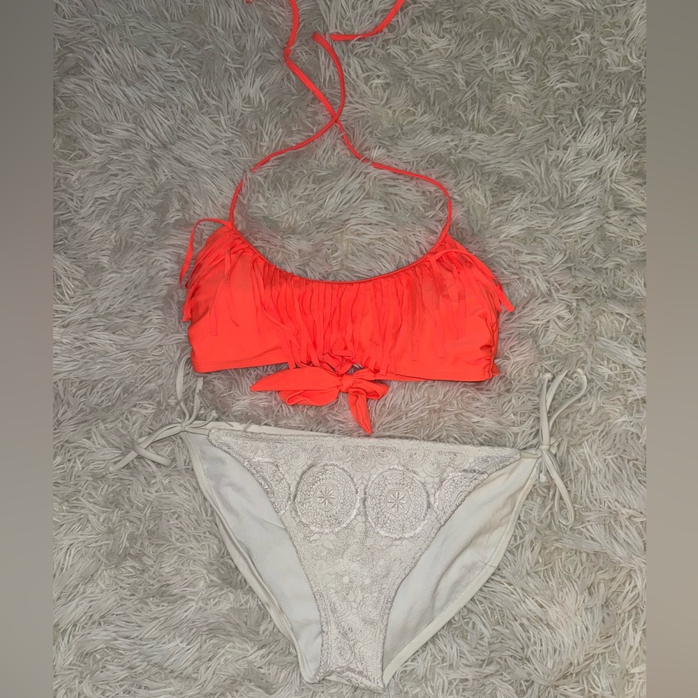 Neon orange fringe bikini top with white crochet bottoms